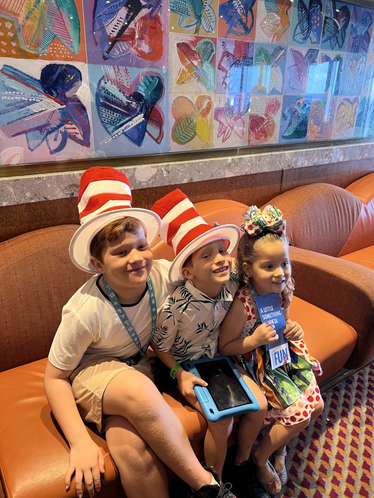Children on cruise ship holiday trip creating family memories together